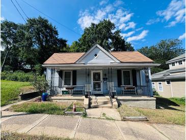 Charming single story home with front porch at 521 E Edenton St, Raleigh, NC 27601