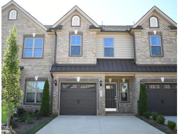 Brick townhouse with a 2-car garage at 1033 Bonanza Ln # 34, Mebane, NC 27302