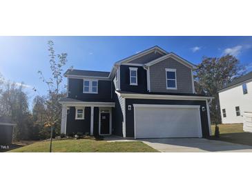 Two story home with gray and navy siding at 19 Longdale Dr, Graham, NC 27253
