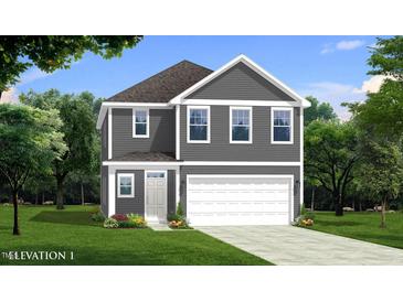 Two story gray house with white garage door and landscaping at 4929 Trout Crest Court, Raleigh, NC 27604
