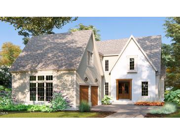 Two-story house with beige siding and brick accents at 3325 Colby Chase Dr # 9, Apex, NC 27539