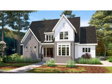 Two-story home with gray brick and white accents at 3331 Colby Chase Dr # 8, Apex, NC 27539
