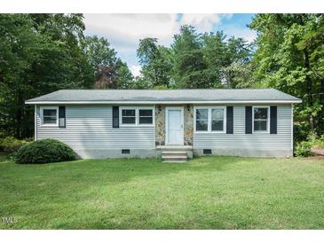 Ranch style home with stone accents and lawn at 683 Baynes Rd, Burlington, NC 27217