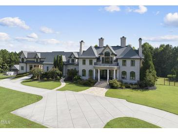 Luxury home with expansive grounds and large driveway at 12660 Boyce Milll Road, Raleigh, NC 27613