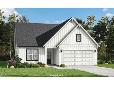 Craftsman style home with white siding, and two car garage at 108 Ascot, Rocky Mount, NC 27804