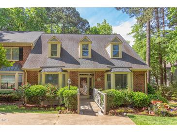 Photo one of 7815 Coach House Ln Raleigh NC 27615 | MLS 10054968