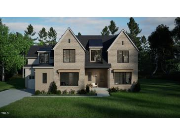 Stunning two-story home with a charming front elevation at 9413 Rawson Ave, Raleigh, NC 27613