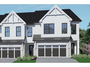 Modern farmhouse style two story home with two car garage at 4046 Elk Creek Ln # 62, Raleigh, NC 27612