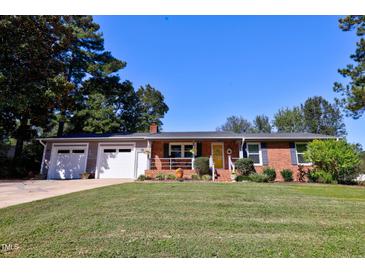 Photo one of 404 Lakeside Dr Garner NC 27529 | MLS 10057690