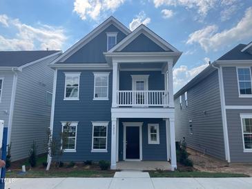 Two-story home with charming curb appeal and balcony at 9200 Leaning Post Rd # 451, Wake Forest, NC 27587