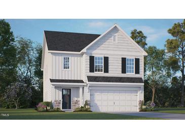 Two story house with white siding, black shutters, and two car garage at 226 River Bank Rd, Fuquay Varina, NC 27526