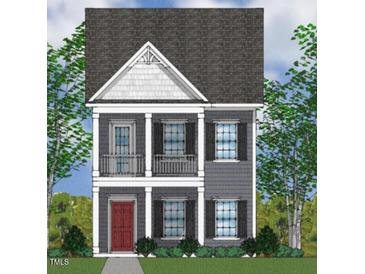 Two-story craftsman style home with gray siding and red door at 9228 Leaning Post Rd # 445, Wake Forest, NC 27587