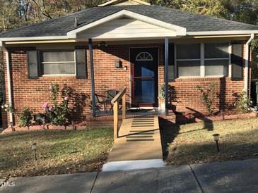 Brick ranch house with a ramp and landscaping at 308 E East End Ave, Durham, NC 27703
