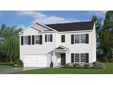Two-story house with white siding, black shutters, and a two-car garage at 316 Leven Dr, Gibsonville, NC 27249