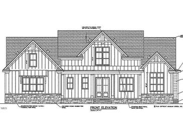 Two-story home with stone accents and a gabled roof at 35 Serenity Woods Trl, Franklinton, NC 27525