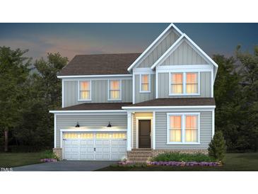 Two-story home with modern exterior and garage at 257 Circle City Way, Pittsboro, NC 27312
