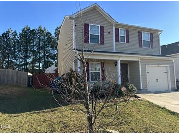 Two story house with a two car garage at 1612 Great Bend Drive, Durham, NC 27704