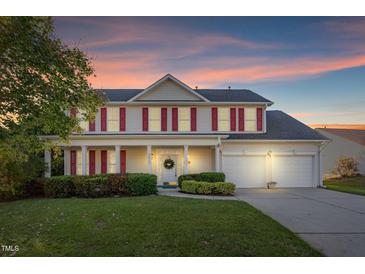 Two-story house with red shutters and two-car garage at 2513 Pepperstone Dr, Graham, NC 27253