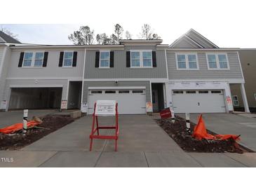 New construction townhome with two-car garage at 7120 Hubner Pl # 38, Cary, NC 27519