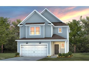 Two-story light gray house with white garage door at 2884 Huxley Way, Apex, NC 27502