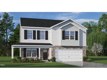 Two-story house with gray siding, black shutters, and a two-car garage at 7622 Michelle Rd, Rocky Mount, NC 27803