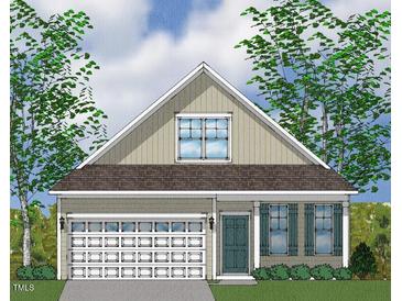 Craftsman style home with a two-car garage and front porch at 103 White Oak Gdn Way # 48, Garner, NC 27529