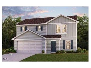 Two-story house with gray siding, brown roof, and a two-car garage at 7510 Tanager Dr, Snow Camp, NC 27349