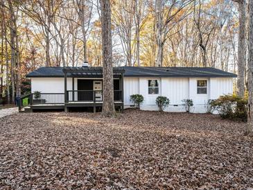 Newly renovated Ranch home with modern deck and pergola at 6625 Suburban Dr, Raleigh, NC 27615