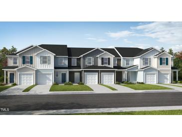 New townhouses with attached garages and grassy yards at 126 Parker Ln, Mebane, NC 27302