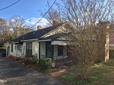 One-story house with a front porch and a yard at 2219 Fitzgerald Ave, Durham, NC 27707