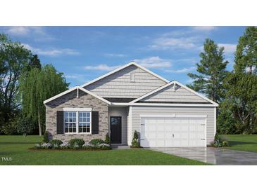 Craftsman style home with stone accents and a two-car garage at 40 Saddle Mare St, Clayton, NC 27520