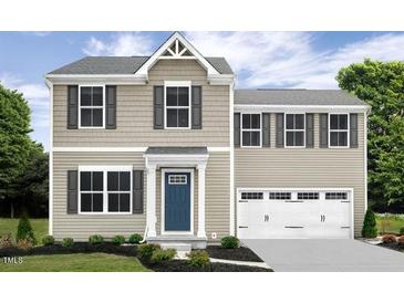 Two-story house with beige siding, a blue door, and a white three-car garage at 481 Autumn Moon Dr, Zebulon, NC 27597