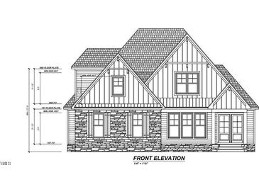 Two-story house with stone accents and multiple windows at 12 Cabin Creek Crk, Pittsboro, NC 27312