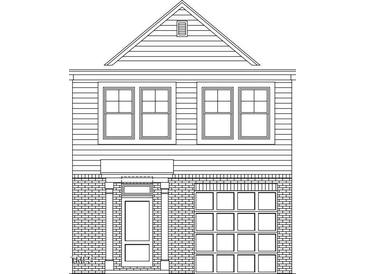 Two-story home with brick facade, attached garage, and multiple windows at 535 Eversden Dr, Zebulon, NC 27597