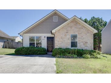 Charming one-story home with stone and siding accents at 1732 Great Bend Dr, Durham, NC 27704