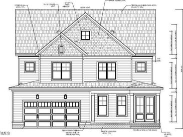 Two-story home with a front-facing garage and classic design at 2517 Lillian Woods Way, Wendell, NC 27591