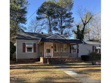 Charming one-story house with a covered porch and well-maintained lawn at 1017 Long Ave, Rocky Mount, NC 27801