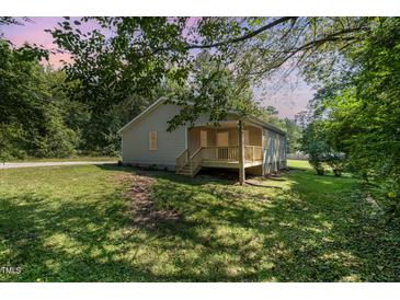 Newly built home with a spacious deck and a large backyard at 722 Martin St, Durham, NC 27704