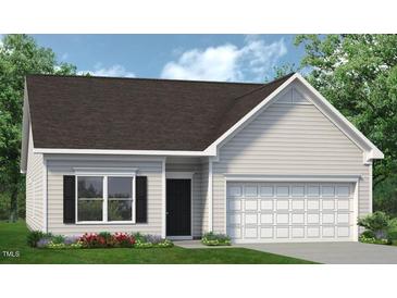 One-story house with a neutral color scheme and a two-car garage at 87 Vili Dr, Broadway, NC 27505