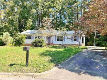 Photo one of 305 N Montreal Ct Cary NC 27511 | MLS 2538182