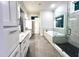 Elegant bathroom with soaking tub, walk-in shower, and granite countertops at 1350 Geneva Albright Rd, Graham, NC 27253