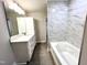 Bathroom with a bathtub, shower, and modern vanity at 1350 Geneva Albright Rd, Graham, NC 27253