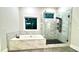 Spa-like bathroom with soaking tub and glass shower at 1350 Geneva Albright Rd, Graham, NC 27253