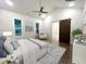 Main bedroom with a king-size bed and en-suite bathroom access at 1350 Geneva Albright Rd, Graham, NC 27253