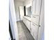 Bathroom with granite countertop and white cabinets at 1350 Geneva Albright Rd, Graham, NC 27253