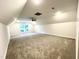 Spacious bonus room with carpeted floor and ceiling fan at 1350 Geneva Albright Rd, Graham, NC 27253