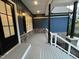 Covered porch with stone accents and a view of the yard at 1350 Geneva Albright Rd, Graham, NC 27253
