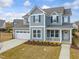Image 1 of 37: 124 Crested Coral Dr, Holly Springs