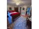 Large bedroom with wood floors, a walk-in closet and access to a bathroom at 1375 Garden Crest Cir, Raleigh, NC 27609