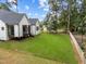 Large backyard with sod and privacy fence at 5305 Dixon Dr, Raleigh, NC 27609